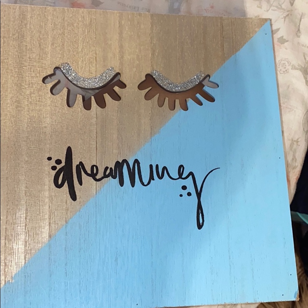 Wood decoration that says “dreaming “